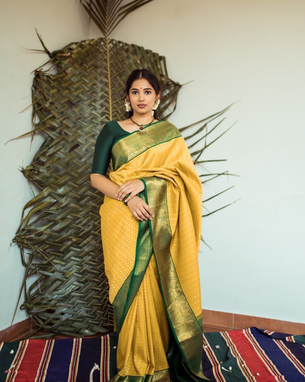 Close-up view of the fine craftsmanship of Kadwa technique on a Soft Silk Saree